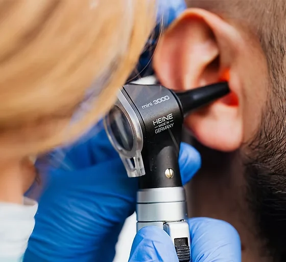 Ear examination using a professional otoscope